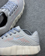 Tênis Nike Mind - Cinza