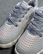 Tênis Nike Mind - Cinza