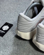 Tênis Nike Mind - Cinza